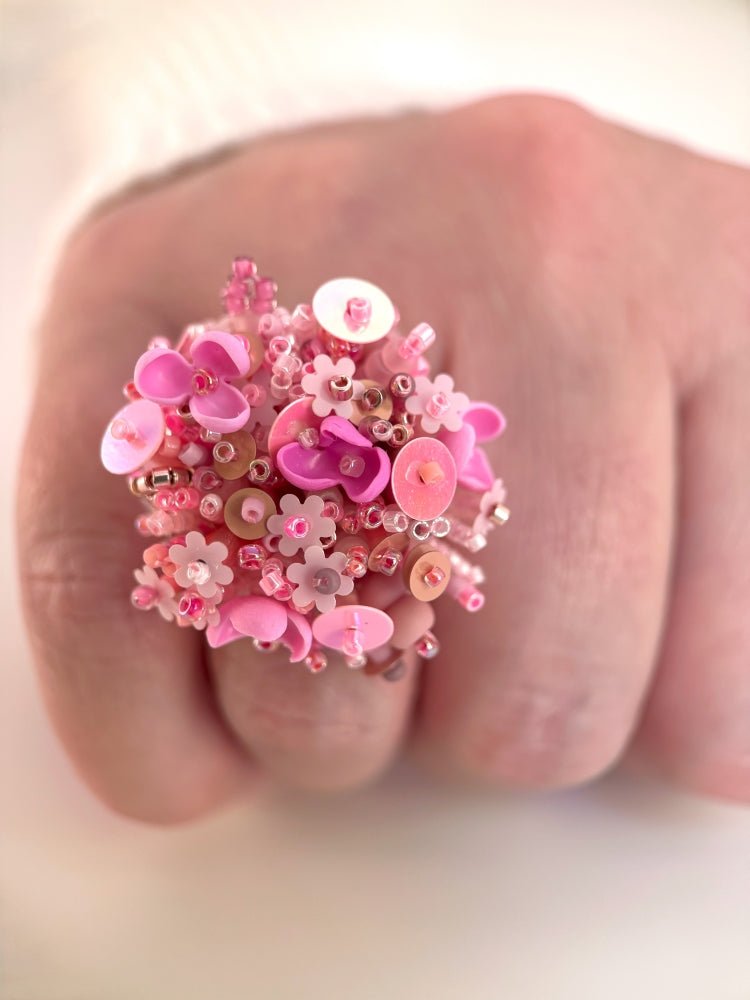 Handmade volume-beaded statement ring with floral design, polymer clay & sequins in pink hues - Ornamentico shop