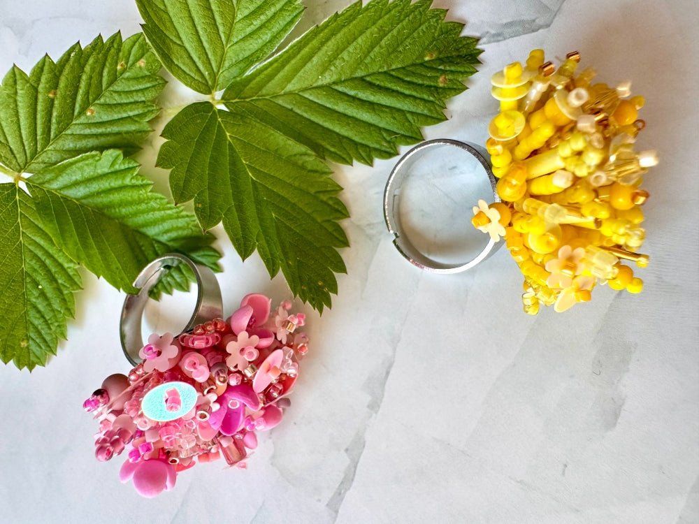 Handmade volume-beaded statement ring with floral design, polymer clay & sequins in pink hues - Ornamentico shop