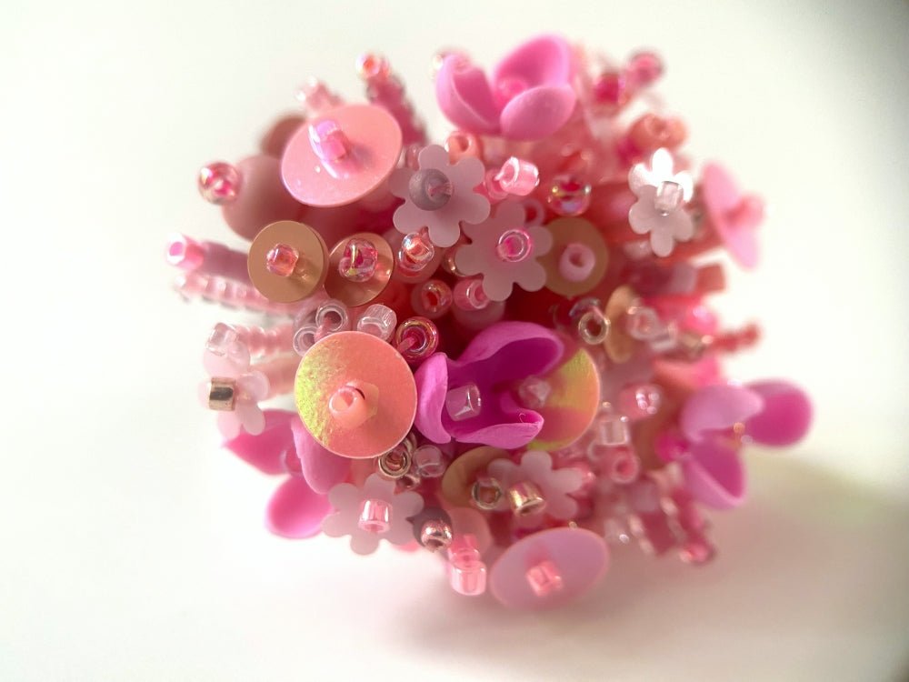 Handmade volume-beaded statement ring with floral design, polymer clay & sequins in pink hues - Ornamentico shop