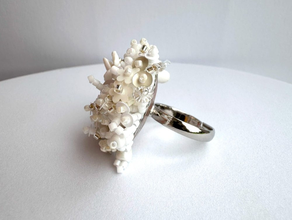 Handmade volume-beaded statement ring with floral design in white hues - Ornamentico shop