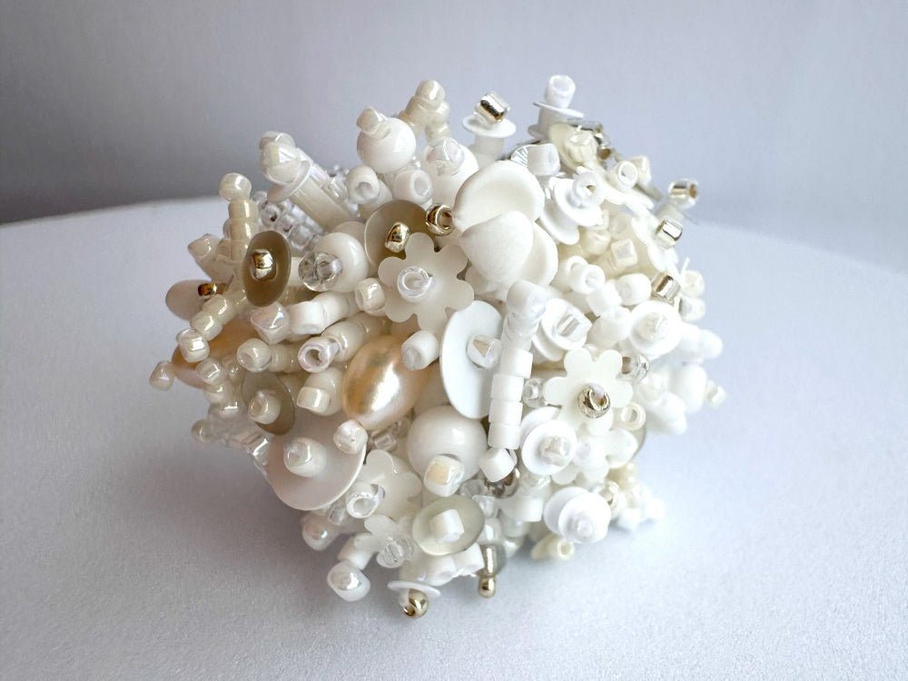 Handmade volume-beaded statement ring with floral design in white hues - Ornamentico shop