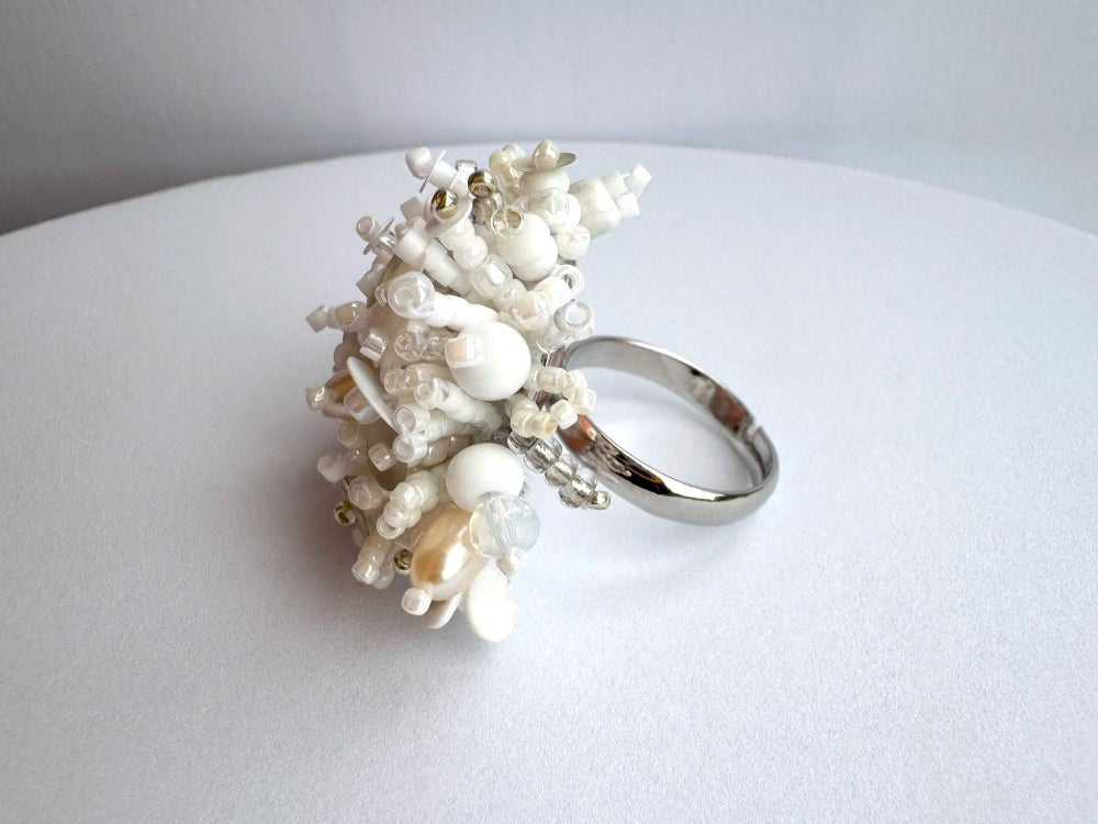 Handmade volume-beaded statement ring with floral design in white hues - Ornamentico shop