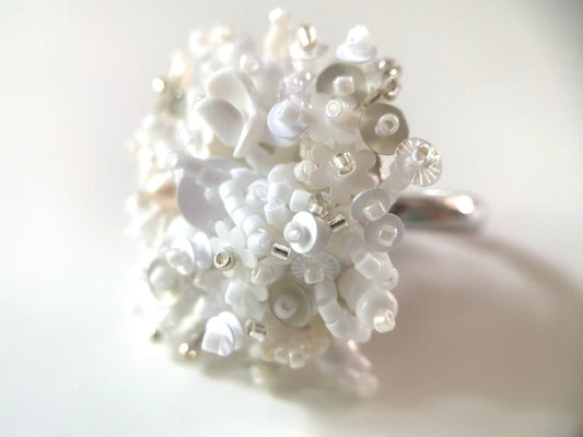 Handmade volume-beaded statement ring with floral design in white hues - Ornamentico shop