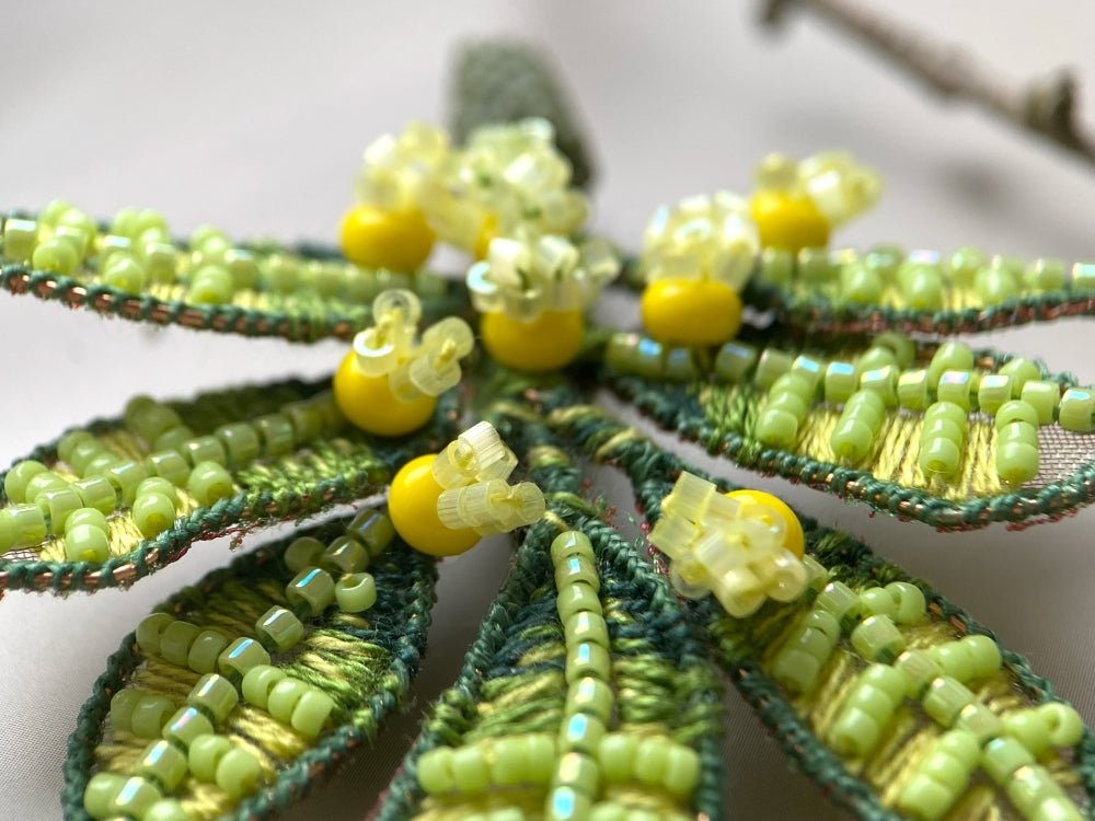 Handmade beaded and embroidered brooch with beaded leaves and yellow mimosa-inspired flowers - Ornamentico shop