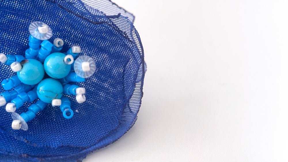 Handmade floral stud earrings crafted from organza fabric, turquoise stones and Japanese glass beads