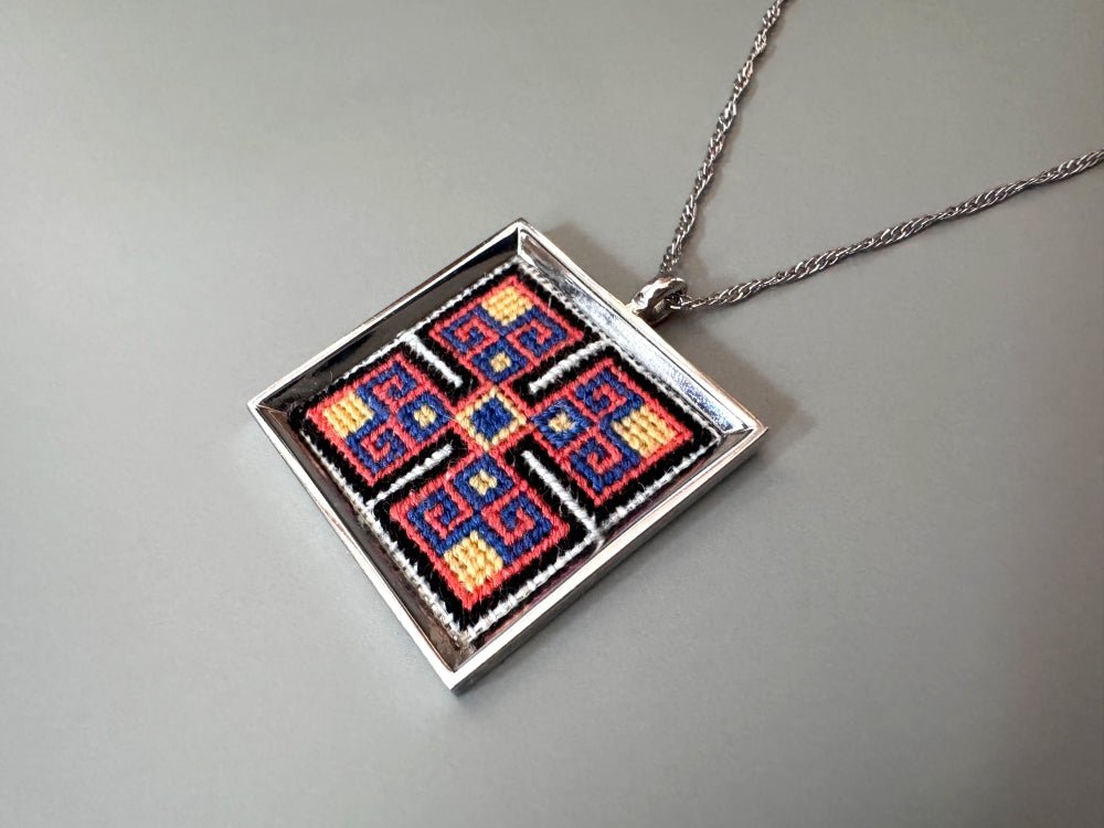 Unique hand embroidered pendant in oriental design, set in custom silver frame - Ornamentico shop