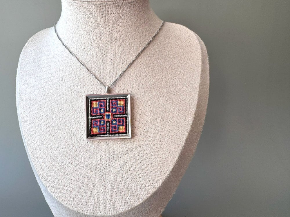 Unique hand embroidered pendant in oriental design, set in custom silver frame - Ornamentico shop