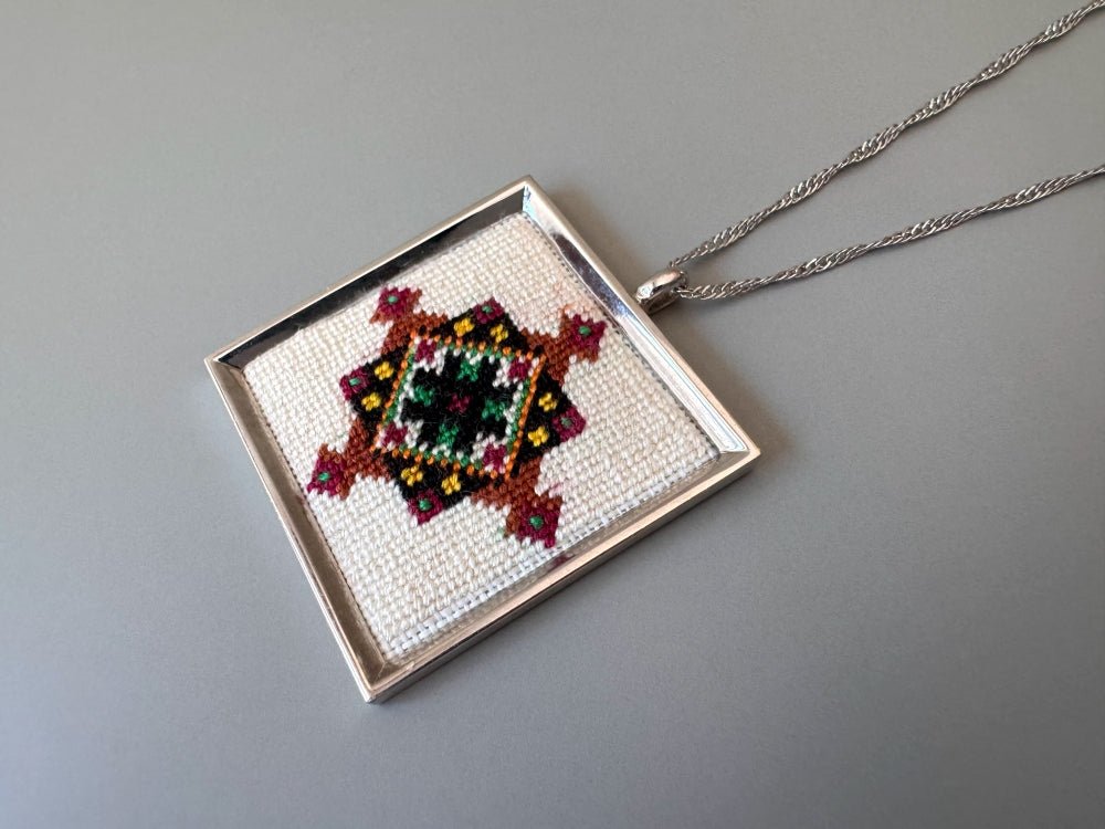 Unique hand embroidered pendant in oriental design, set in custom silver frame - Ornamentico shop