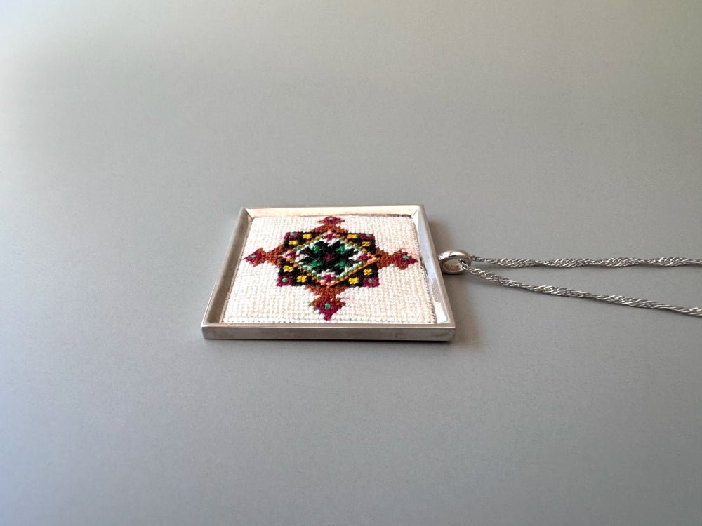 Unique hand embroidered pendant in oriental design, set in custom silver frame - Ornamentico shop