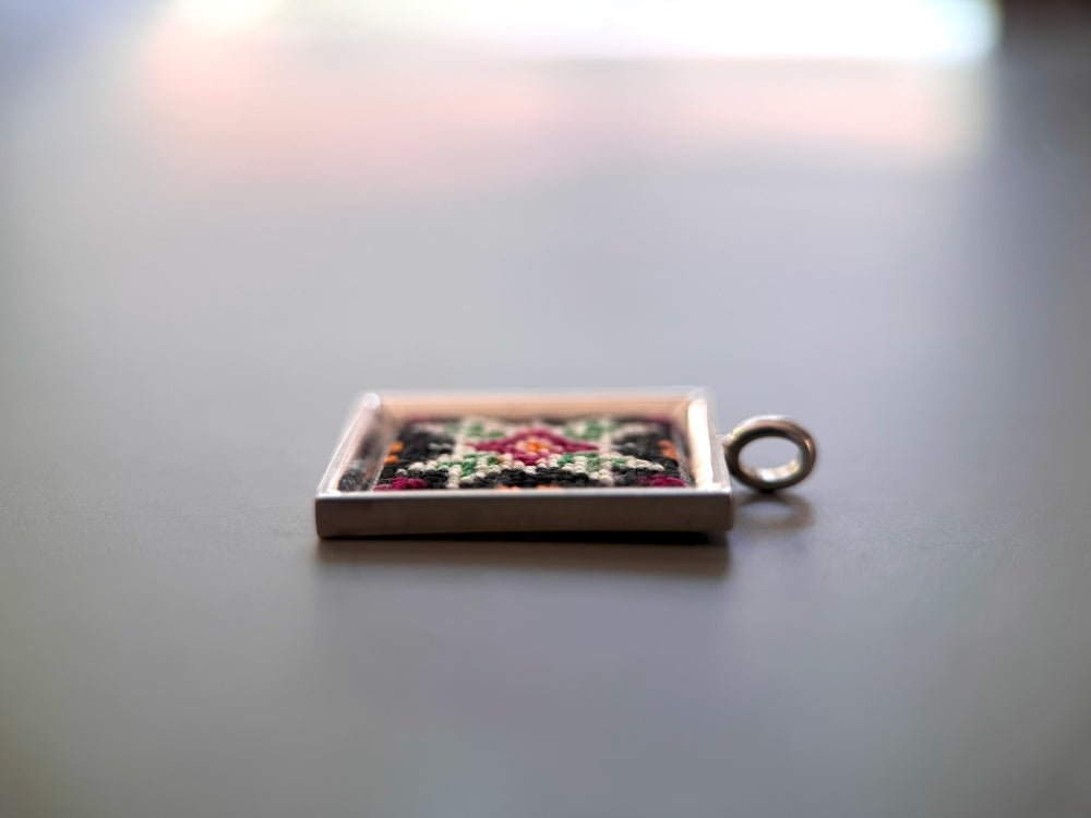 Unique hand embroidered pendant in oriental design inspired by traditional Turkish carpets and set in custom silver frame - Ornamentico shop