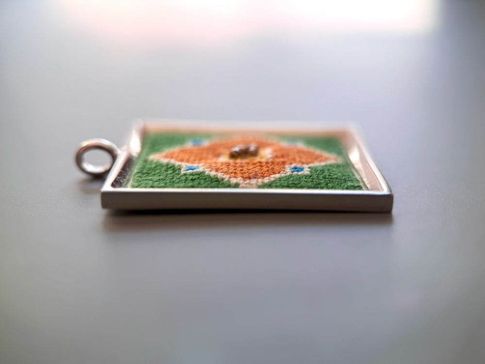 Unique hand embroidered pendant in oriental design inspired by traditional Turkish tiles and carpets, set in custom silver frame - Ornamentico shop