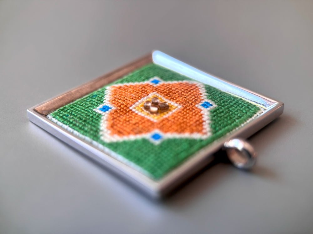 Unique hand embroidered pendant in oriental design inspired by traditional Turkish tiles and carpets, set in custom silver frame - Ornamentico shop