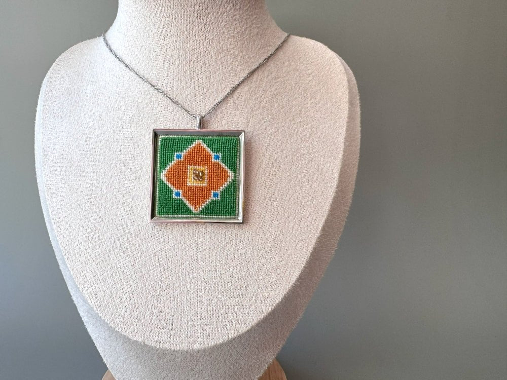 Unique hand embroidered pendant in oriental design inspired by traditional Turkish tiles and carpets, set in custom silver frame - Ornamentico shop