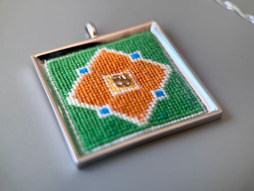 Unique hand embroidered pendant in oriental design inspired by traditional Turkish tiles and carpets, set in custom silver frame - Ornamentico shop