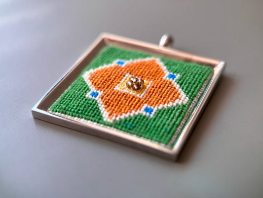 Unique hand embroidered pendant in oriental design inspired by traditional Turkish tiles and carpets, set in custom silver frame - Ornamentico shop