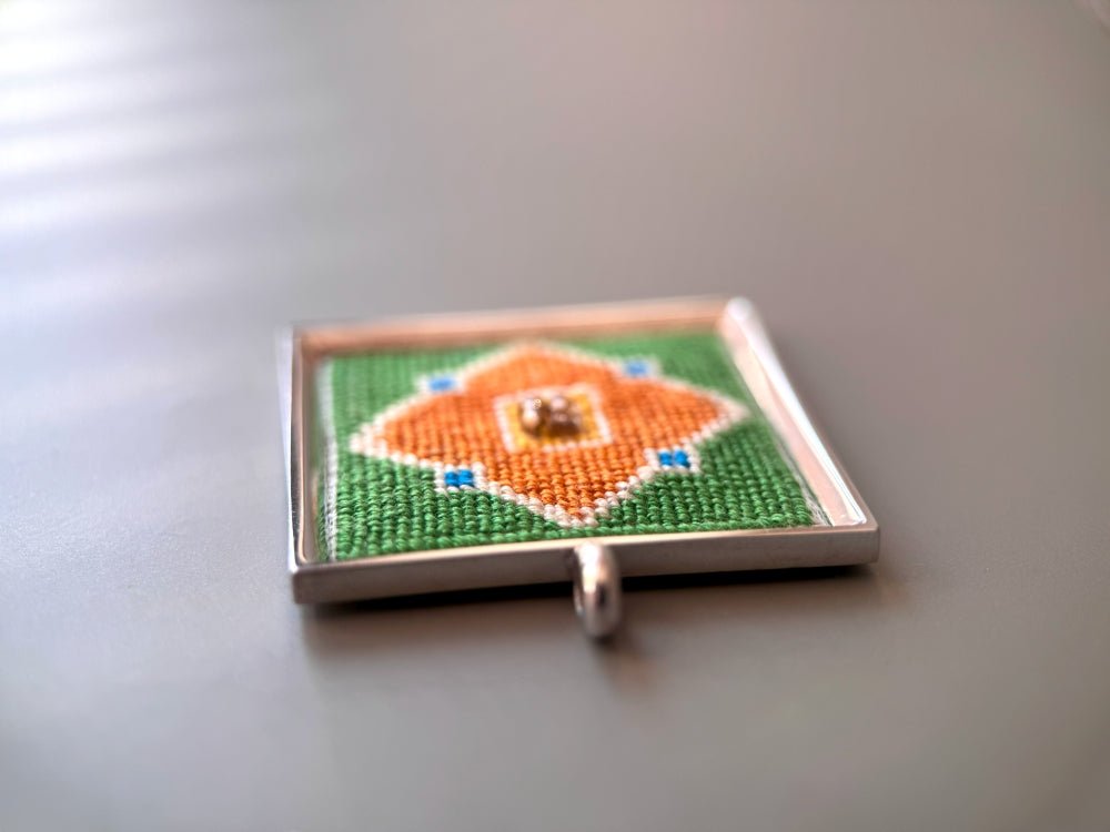 Unique hand embroidered pendant in oriental design inspired by traditional Turkish tiles and carpets, set in custom silver frame - Ornamentico shop