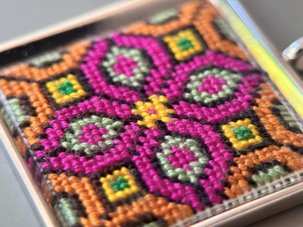 Unique hand embroidered pendant in oriental design inspired by traditional Turkish carpets, set in custom silver frame - Ornamentico shop