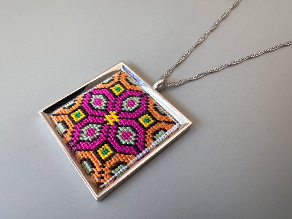 Unique hand embroidered pendant in oriental design inspired by traditional Turkish carpets, set in custom silver frame - Ornamentico shop