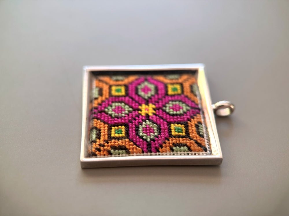 Unique hand embroidered pendant in oriental design inspired by traditional Turkish carpets, set in custom silver frame - Ornamentico shop