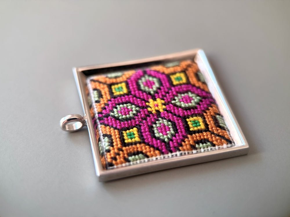 Unique hand embroidered pendant in oriental design inspired by traditional Turkish carpets, set in custom silver frame - Ornamentico shop