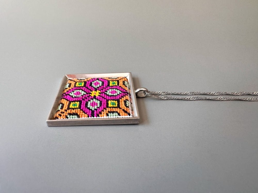 Unique hand embroidered pendant in oriental design inspired by traditional Turkish carpets, set in custom silver frame - Ornamentico shop