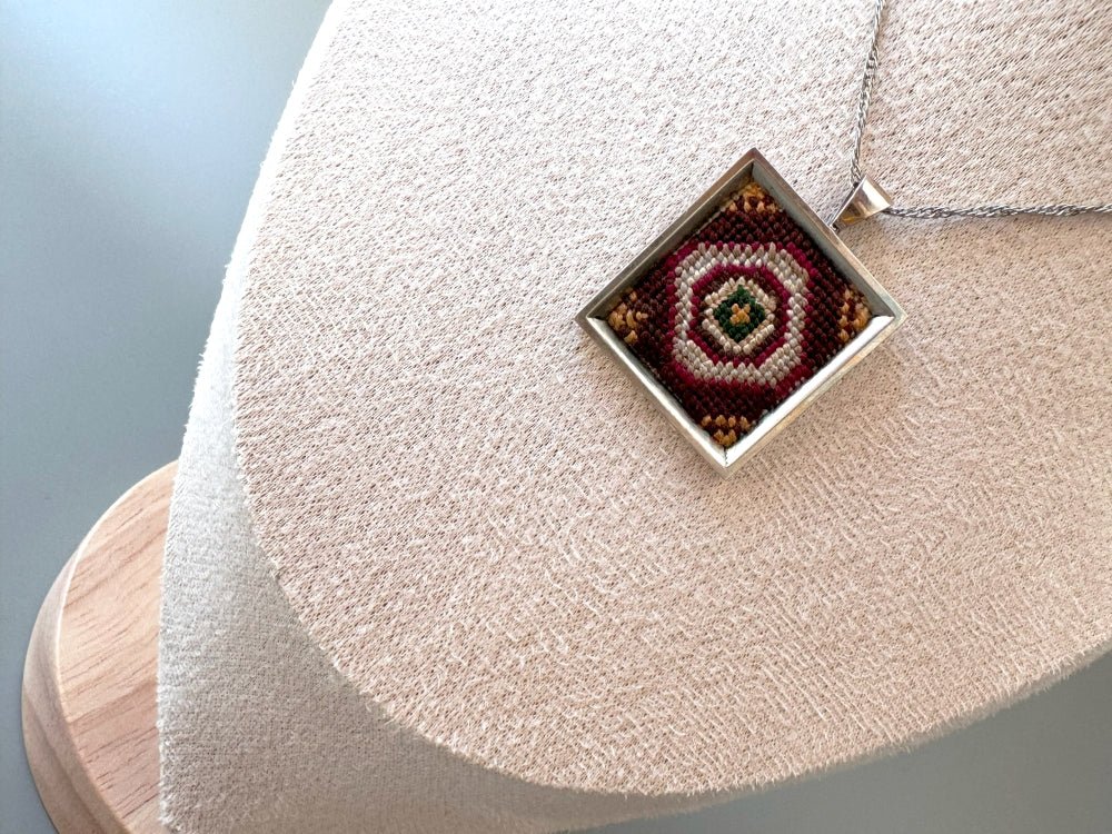 Unique pendant with delicate hand embroidery in oriental design, set in custom silver frame - Ornamentico shop