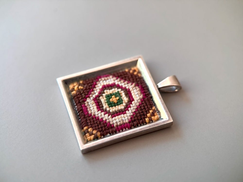 Unique pendant with delicate hand embroidery in oriental design, set in custom silver frame - Ornamentico shop