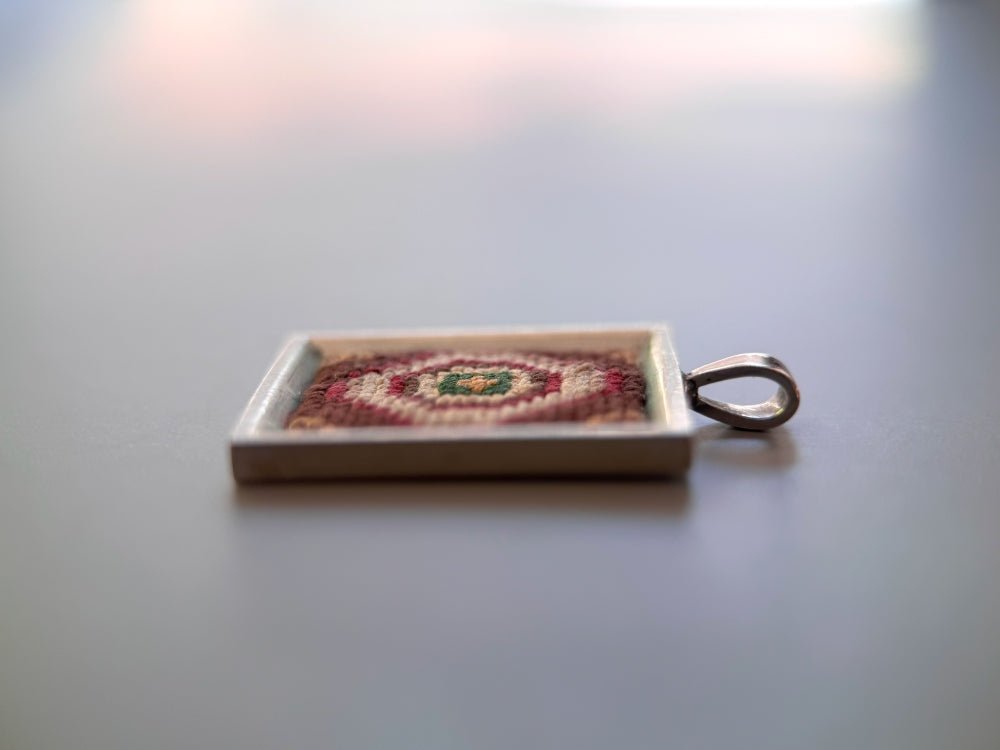 Unique pendant with delicate hand embroidery in oriental design, set in custom silver frame - Ornamentico shop