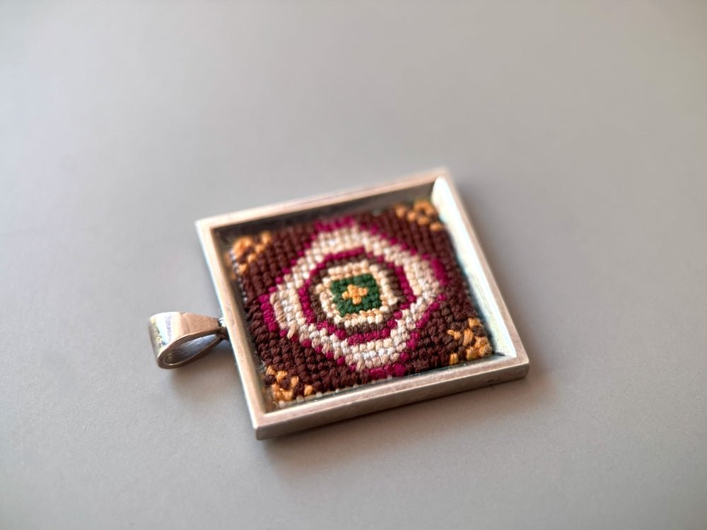 Unique pendant with delicate hand embroidery in oriental design, set in custom silver frame - Ornamentico shop