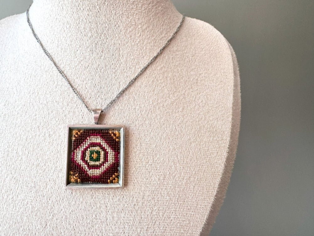 Unique pendant with delicate hand embroidery in oriental design, set in custom silver frame - Ornamentico shop