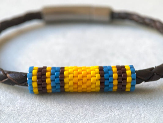 Leather bracelet from genuine brown braided leather and beaded inlay in bright orange, yellow, blue and brown colors - Ornamentico shop
