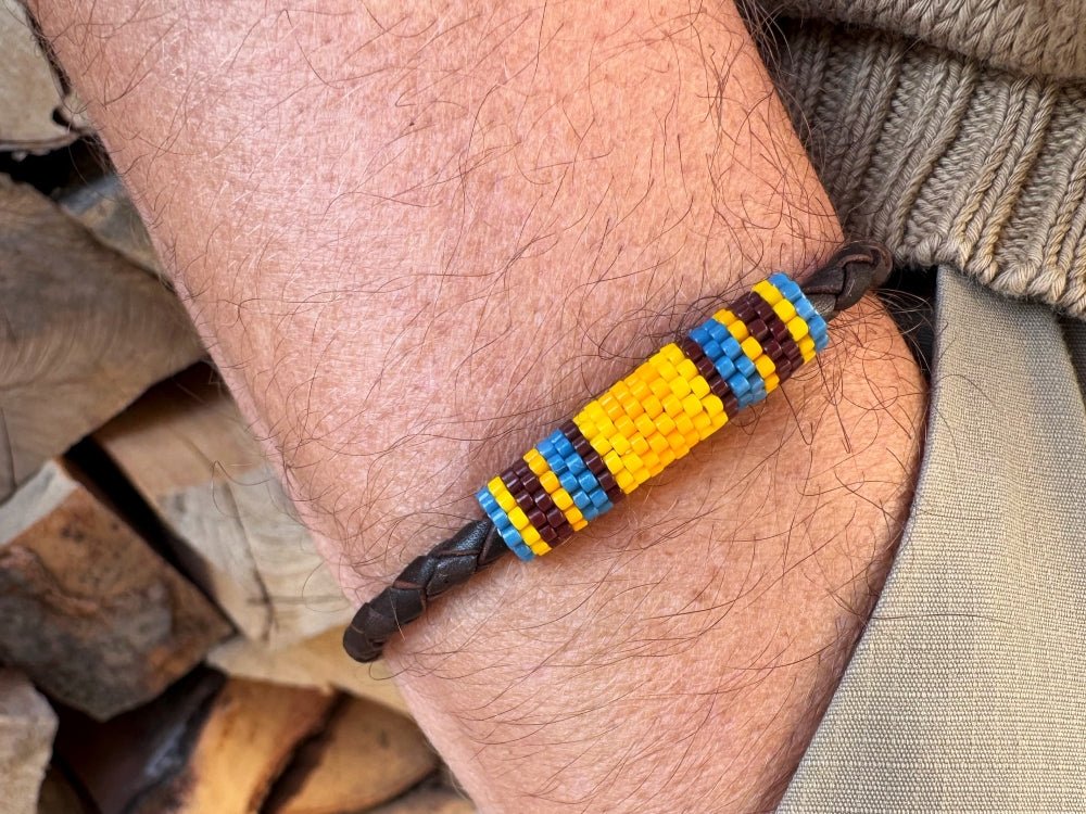 Leather bracelet from genuine brown braided leather and beaded inlay in bright orange, yellow, blue and brown colors - Ornamentico shop