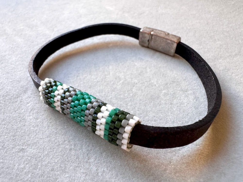 Minimalistic bracelet from black genuine leather decorated with beaded inlay in green, gray and white hues - Ornamentico shop