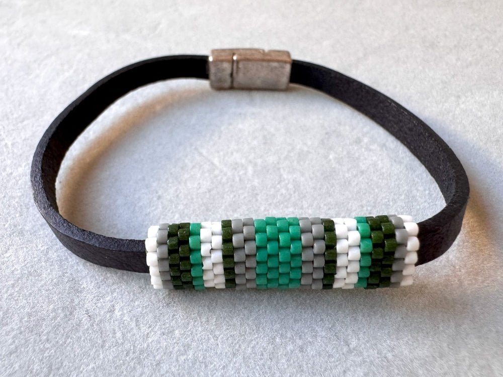 Minimalistic bracelet from black genuine leather decorated with beaded inlay in green, gray and white hues - Ornamentico shop