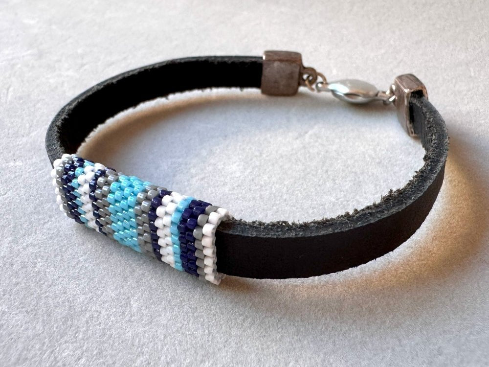 Leather bracelet with peyote stitch beaded inlay in cold blue, white and grey colors - Ornamentico shop