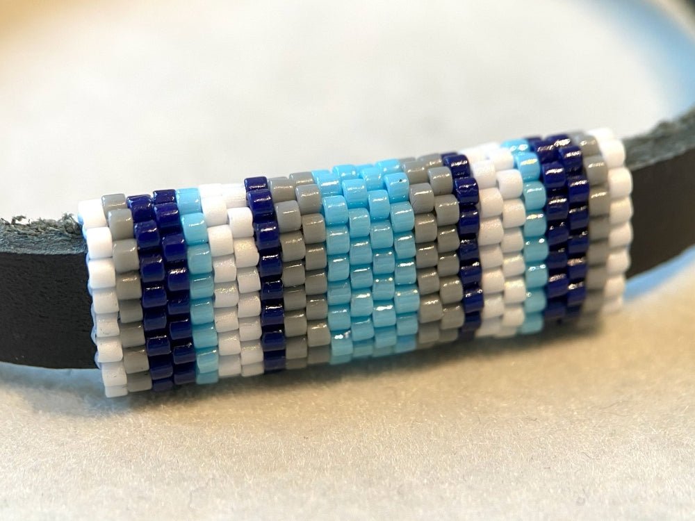 Leather bracelet with peyote stitch beaded inlay in cold blue, white and grey colors - Ornamentico shop