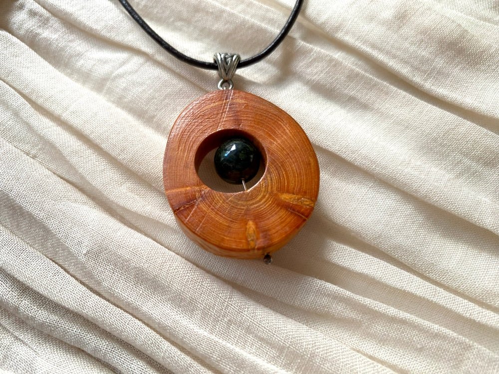 Small handmade wooden pendant with an obsidian bead - Ornamentico shop