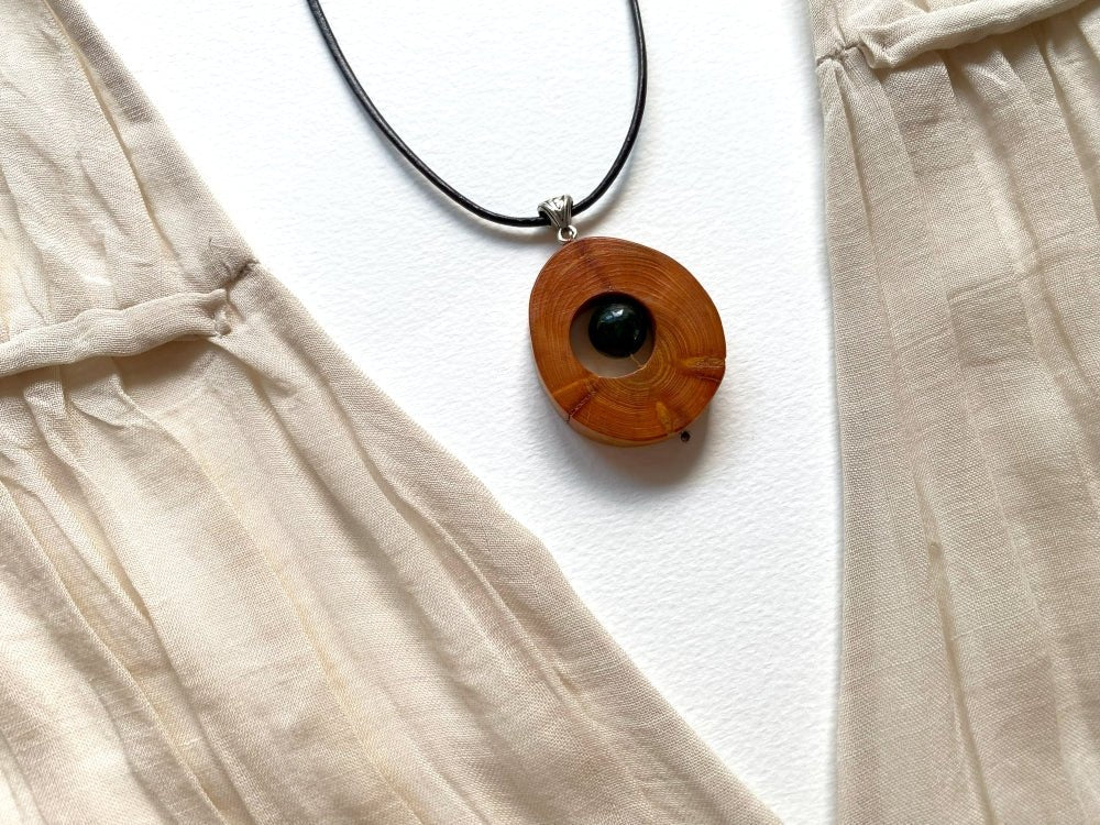 Small handmade wooden pendant with an obsidian bead - Ornamentico shop