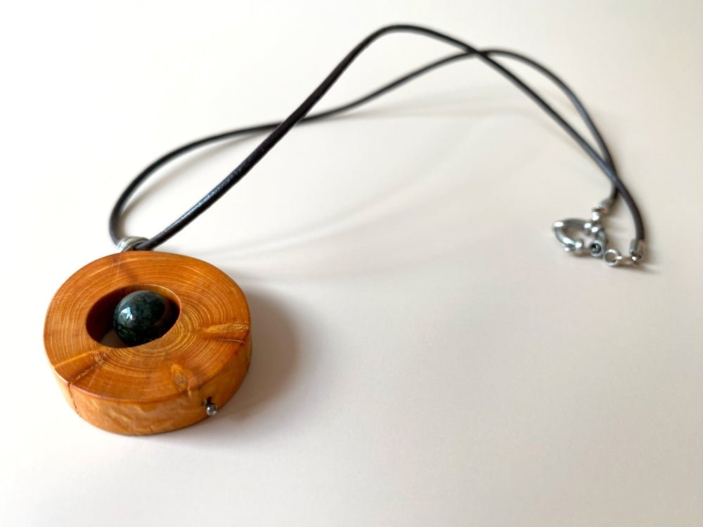 Small handmade wooden pendant with an obsidian bead - Ornamentico shop