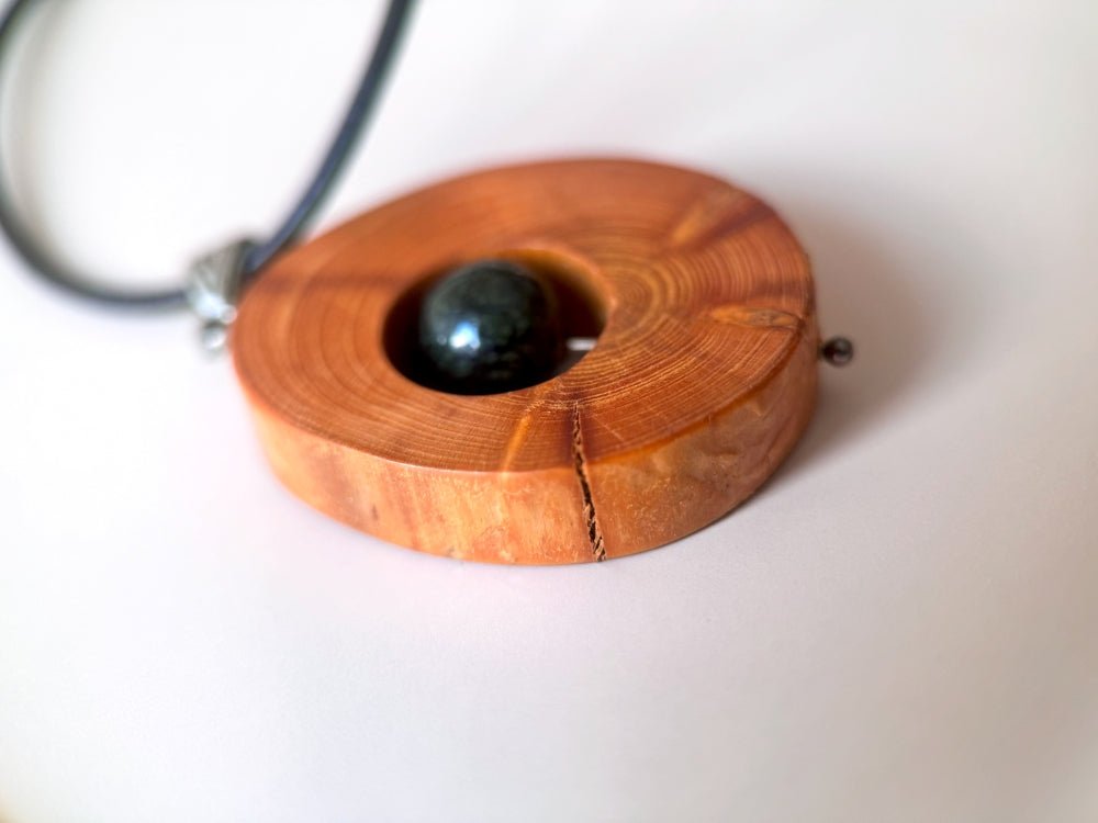 Small handmade wooden pendant with an obsidian bead - Ornamentico shop