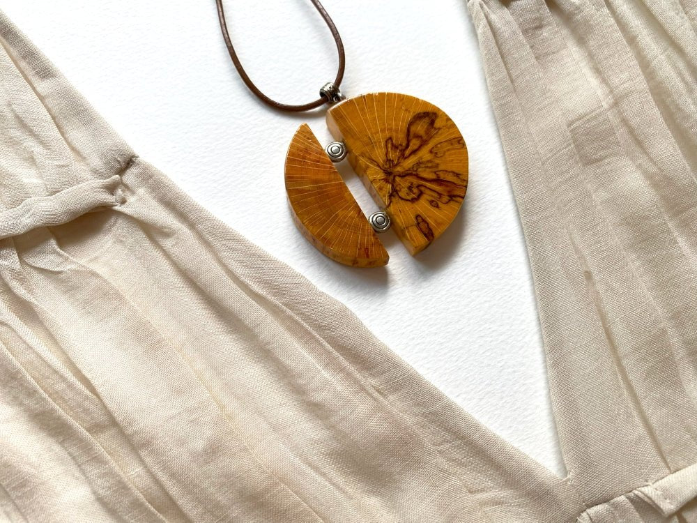 Unique handmade round wooden pendant with silver inlays. Made of carefully polished and varnished wood - Ornamentico shop