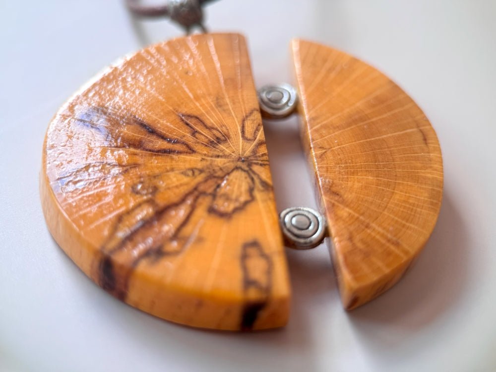 Unique handmade round wooden pendant with silver inlays. Made of carefully polished and varnished wood - Ornamentico shop