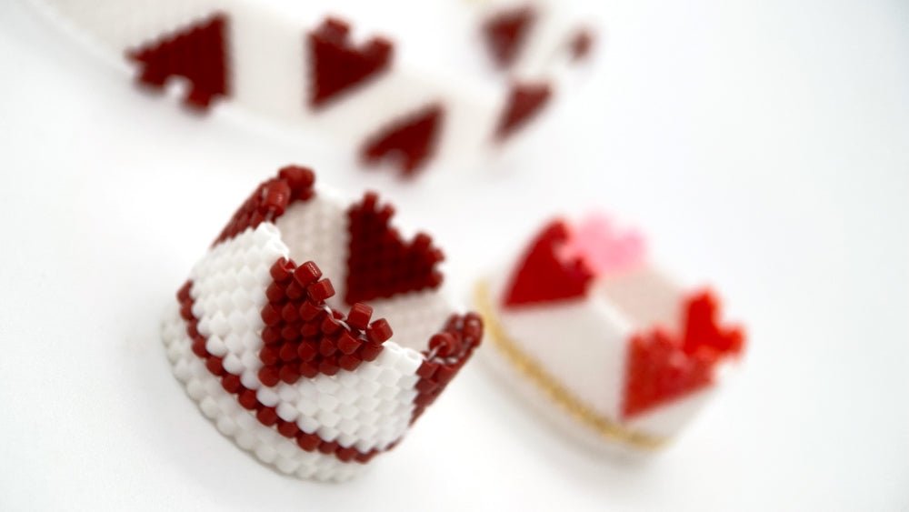 Handmade set of beaded bracelet and two rings ornamented with hearts crafted in peyote stitch technique - Ornamentico shop