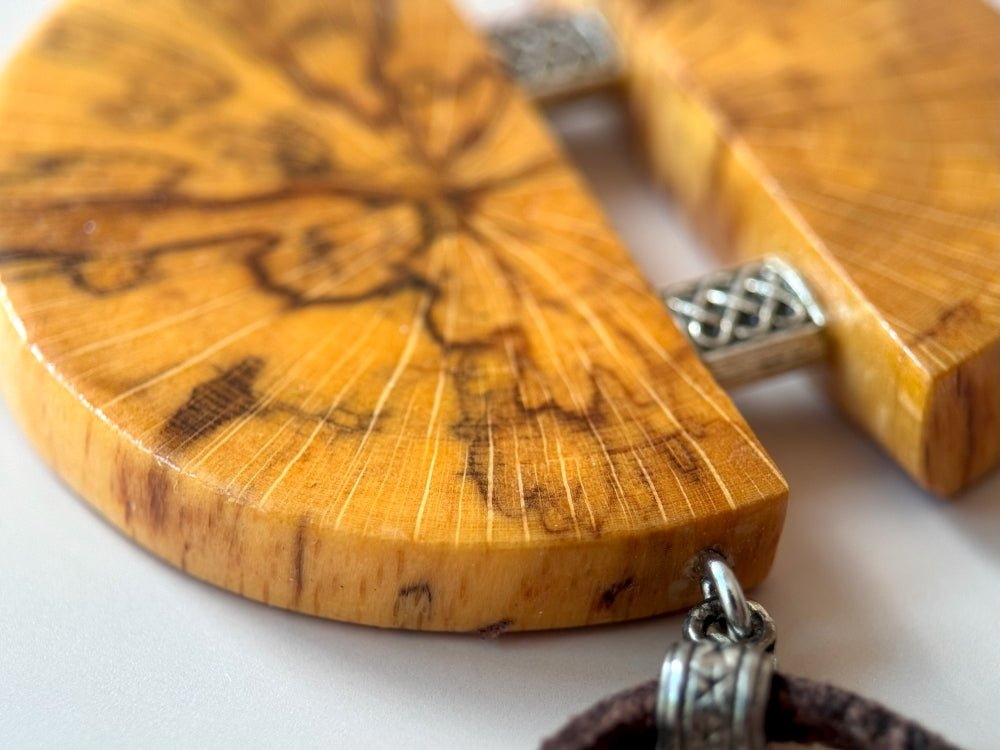 Medium size wooden pendant made from finely polished wood with silver inlays on a woven leather strap - Ornamentico shop