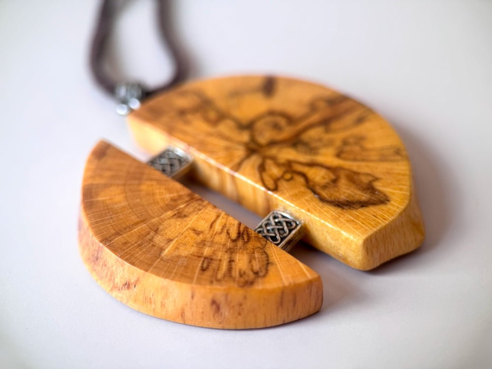 Medium size wooden pendant made from finely polished wood with silver inlays on a woven leather strap - Ornamentico shop