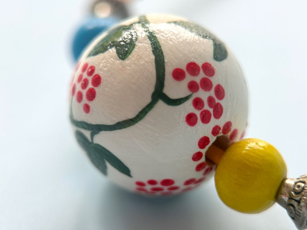 Necklace from hand painted wooden beads crafted in Boho style with beads in colors of Ukrainian flag - Ornamentico shop