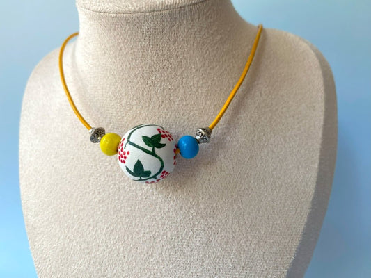 Necklace from hand painted wooden beads crafted in Boho style with beads in colors of Ukrainian flag - Ornamentico shop