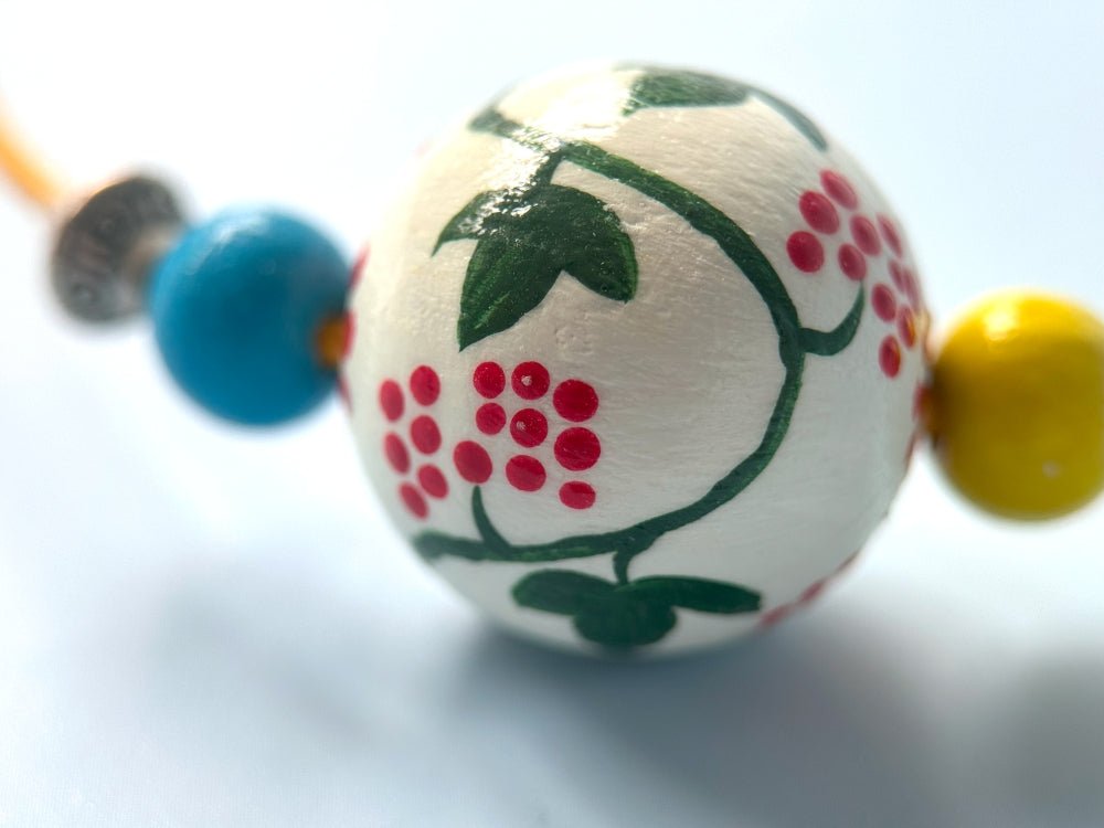 Necklace from hand painted wooden beads crafted in Boho style with beads in colors of Ukrainian flag - Ornamentico shop