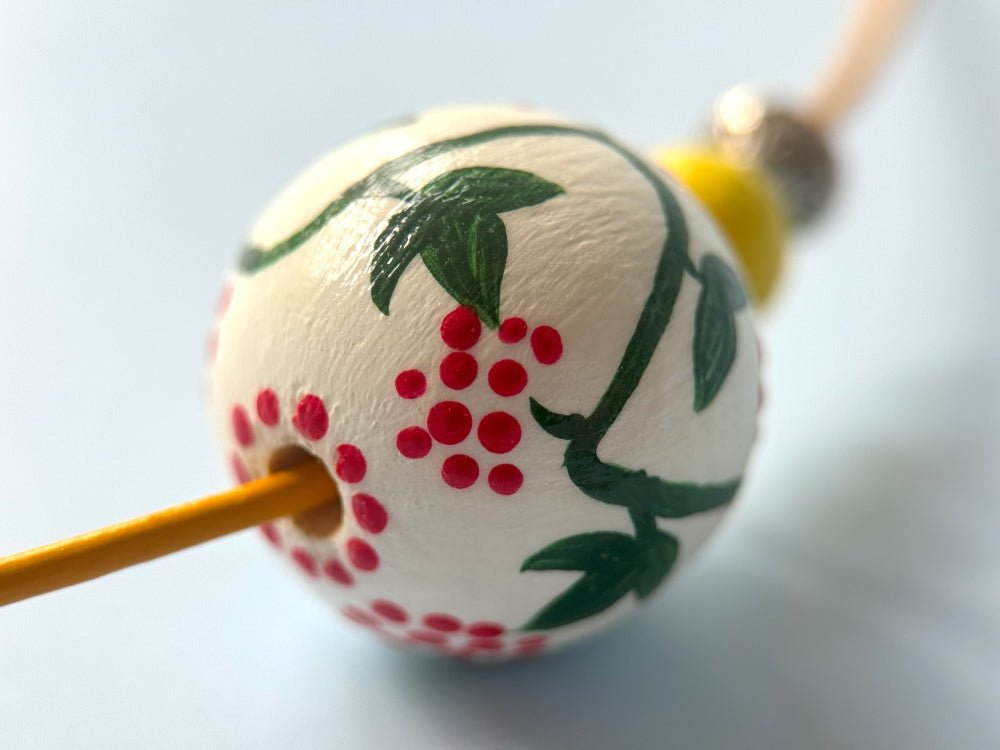 Necklace from hand painted wooden beads crafted in Boho style with beads in colors of Ukrainian flag - Ornamentico shop