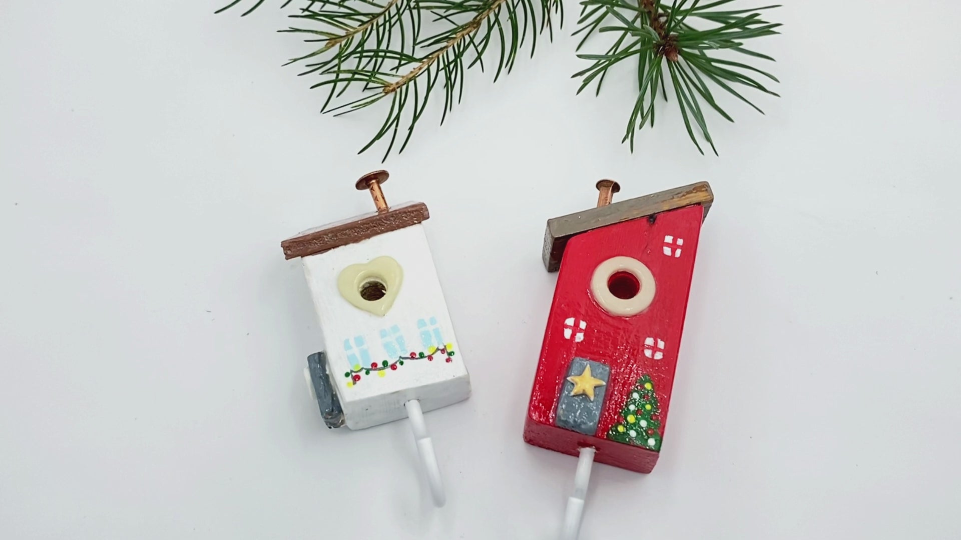 Two handmade wooden painted hooks in the shape of decorated houses - Ornamentico shop